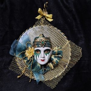 Vintage gypsy green and gold porcelain clown mirror. Unique porcelain face.